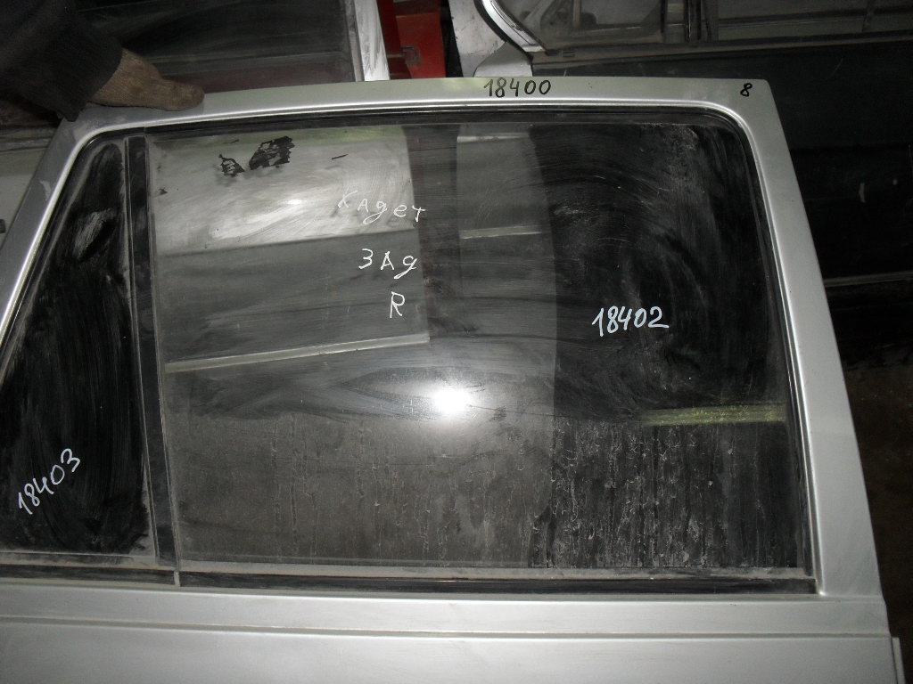 Opel Kadett E (1984 - 1994) Стекло двери задней правой ()