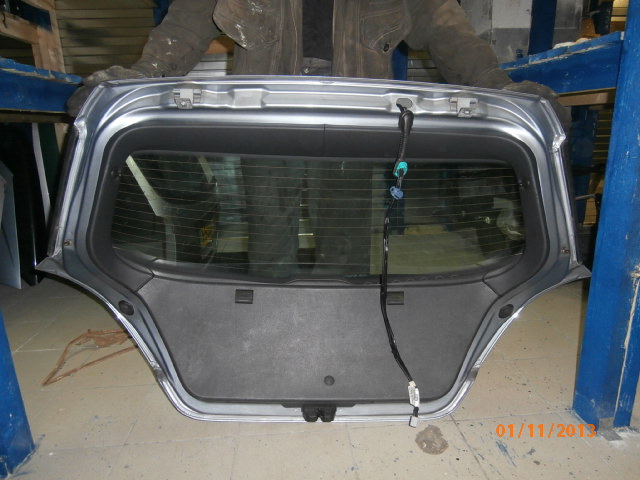 Opel Astra H (2004 - 2010) Обшивка двери багажника (ВЕРХНЯЯ ЛЕВАЯ)
