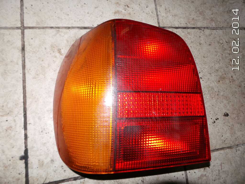 VW Polo (1994 - 1999) Фонарь задний левый (6N0945095  Polo 1999-2001 Х/Б)
